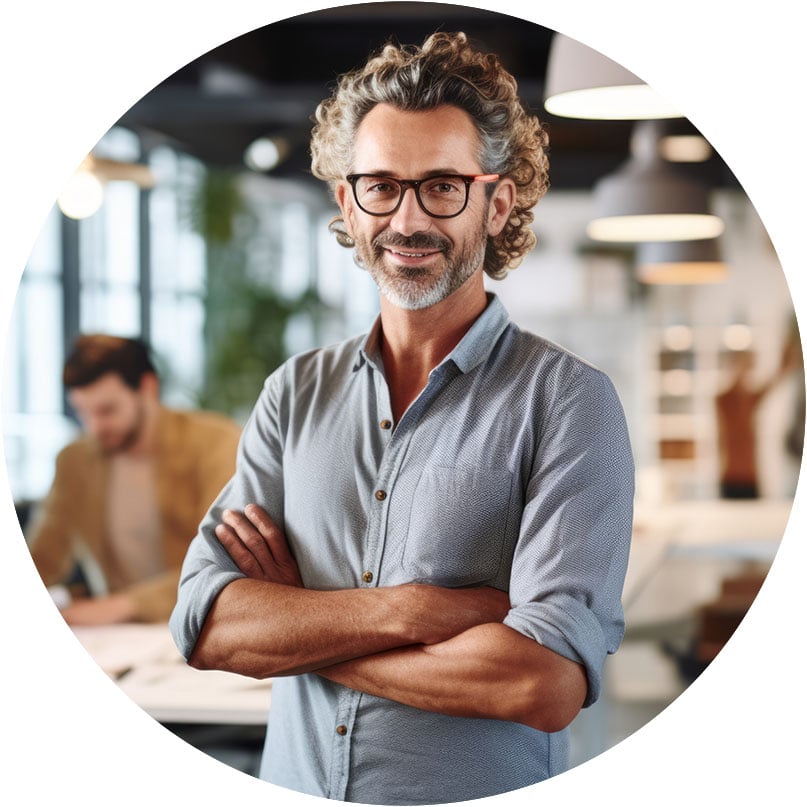 smiling-man-working-in-office-setting