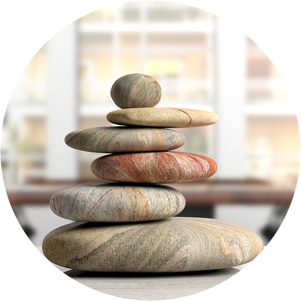 smooth-rocks-balanced-on-desk