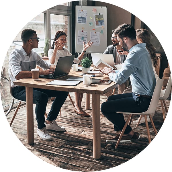 team-meeting-around-table-in-modern-office